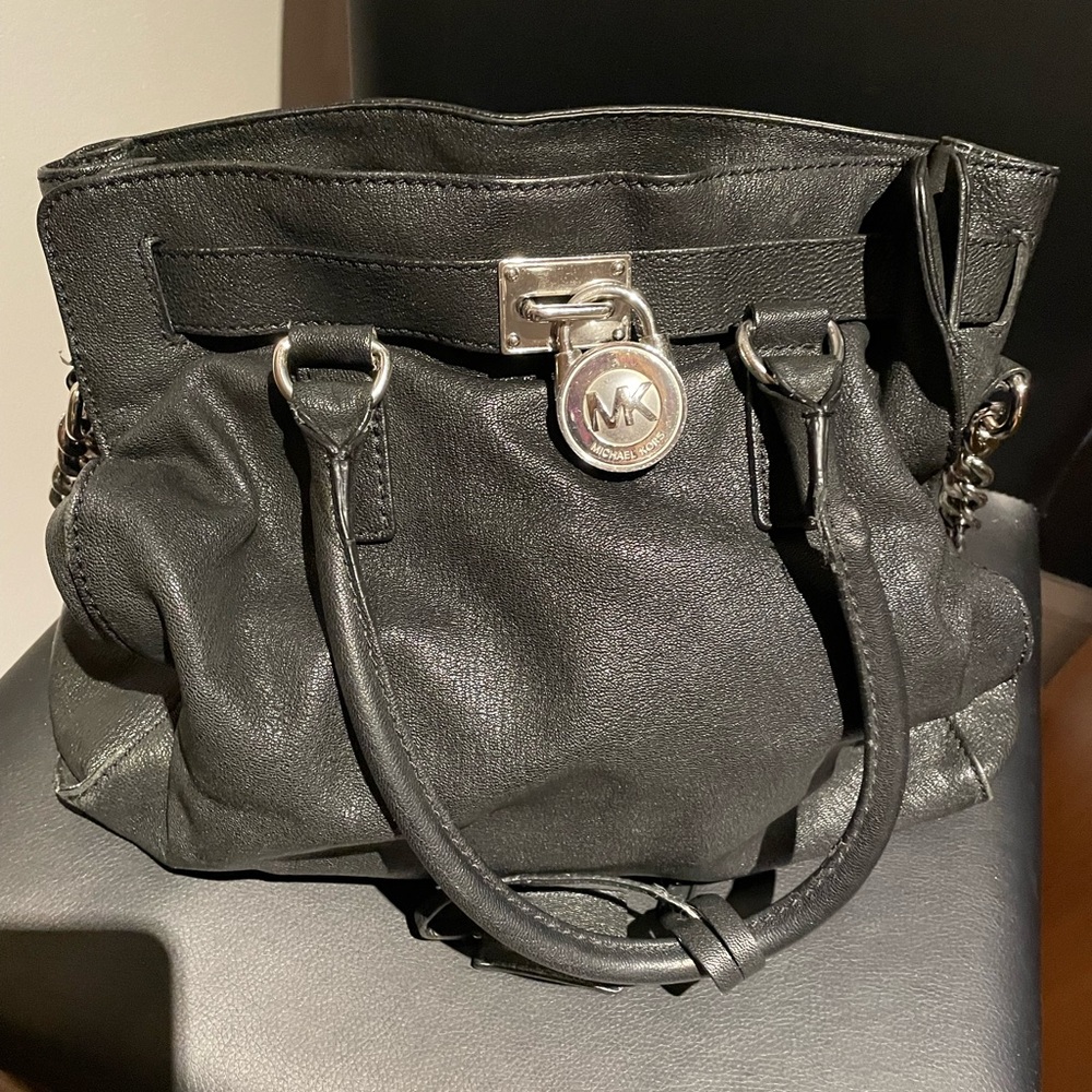 MK black purse. A little used on inside (pic) otherwise in great condition.